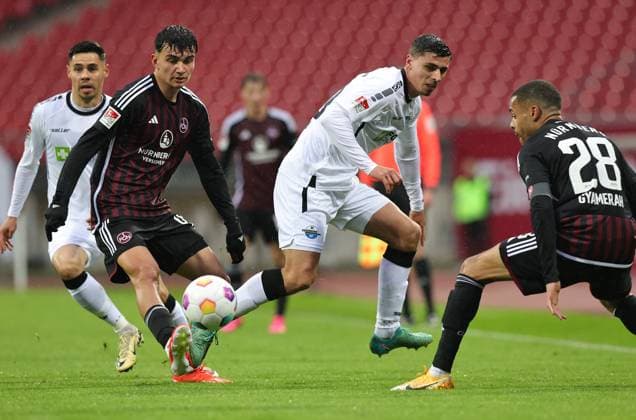 19 04 2024 Soccer Season 2023 2024 2 Soccer Bundesliga 30 Matchday 1 FC Nürnberg FCN Club SC Paderborn 07 SCP Sportfoto Zink DaMa xdaxmax DFL regulations prohibit any use of photographs as image sequences and or quasi video only for editorial use Can Yilmaz Uzun 42, 1 FC Nürnberg FCN Koen Kostons 10, SC Paderborn 07 Jan Gyamerah 28, 1 FC Nürnberg FCN