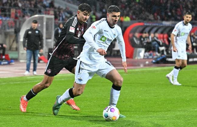19 04 2024 Soccer Season 2023 2024 2 Soccer Bundesliga 30 Matchday 1 FC Nürnberg FCN Club SC Paderborn 07 SCP Sportfoto Zink xwoxzix DFL regulations prohibit any use of photographs as image sequences and or quasi video only for editorial use Can Yilmaz Uzun 42, 1 FC Nürnberg FCN Koen Kostons 10, SC Paderborn 07