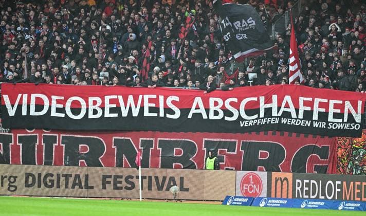 19 04 2024 Soccer Season 2023 2024 2 Soccer Bundesliga 30 Matchday 1 FC Nürnberg FCN Club SC Paderborn 07 SCP Sportfoto Zink xwoxzix DFL regulations prohibit any use of photographs as image sequences and or quasi video only for editorial use Clubfans Fans Fanblock Spruchband Banner Videobeweis VAR abschaffen