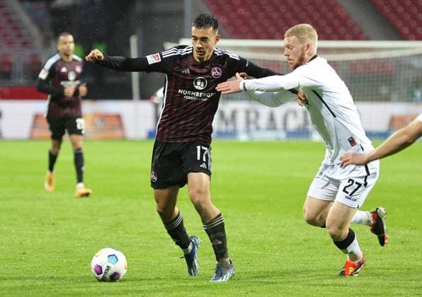 19 04 2024 Soccer Season 2023 2024 2 Soccer Bundesliga 30 Matchday 1 FC Nürnberg FCN Club SC Paderborn 07 SCP Sportfoto Zink DaMa xdaxmax DFL regulations prohibit any use of photographs as image sequences and or quasi video only for editorial use Jens Castrop 17, 1 FC Nürnberg FCN Kai Klefisch 27, SC Paderborn 07