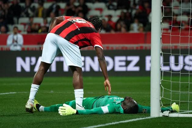 Terem Moffi (OGC Nice) - Yvon Mvogo (FC Lorient) FOOTBALL : OGC Nice vs FC Lorient - Ligue 1 Uber Eats - Nice - 19 04 2024 NorbertScanella Panoramic 