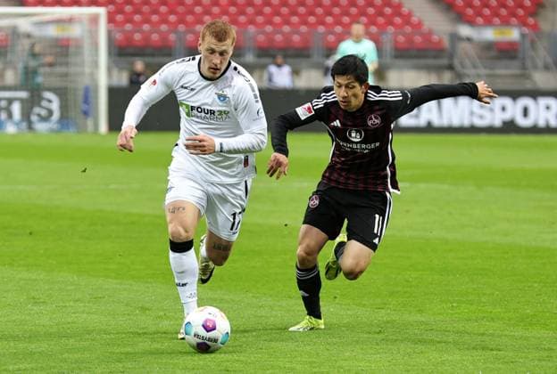 19 04 2024 Soccer Season 2023 2024 2 Soccer Bundesliga 30 Matchday 1 FC Nuremberg FCN Club SC Paderborn 07 SCP Sportfoto Zink DaMa xdaxmax DFL regulations prohibit any use of photographs as image sequences and or quasi video only for editorial use Laurin Curda 17, SC Paderborn 07 Kanji Okunuki 11, 1 FC Nuremberg FCN
