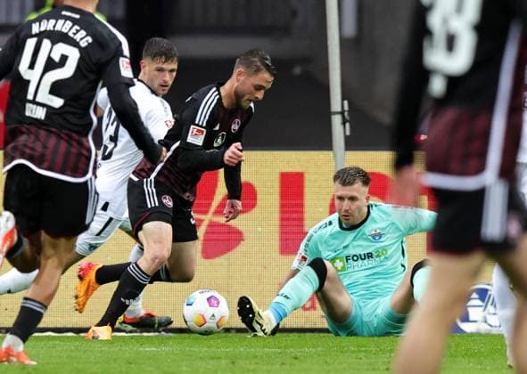 19 04 2024 Soccer Season 2023 2024 2 Soccer Bundesliga 30 Matchday 1 FC Nürnberg FCN Club SC Paderborn 07 SCP Sportfoto Zink DaMa xdaxmax DFL regulations prohibit any use of photographs as image sequences and or quasi video only for editorial use Lukas Schleimer 36, 1 FC Nürnberg FCN Pelle Boevink 1, SC Paderborn 07