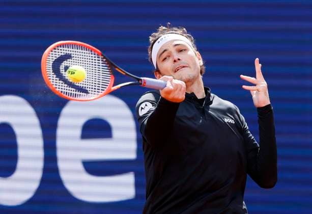 (240421) -- MUNICH, April 21, 2024 -- Taylor Fritz competes during the men s singles semifinal match between Taylor Fritz of the United States and Cristian Garin of Chile at the BMW Open 2024 tennis tournament in Munich, Germany, on April 20, 2024. (Photo by Xinhua) (SP)GERMANY-MUNICH-TENNIS-BMW OPEN-SEMIFINAL PhilippexRuiz 