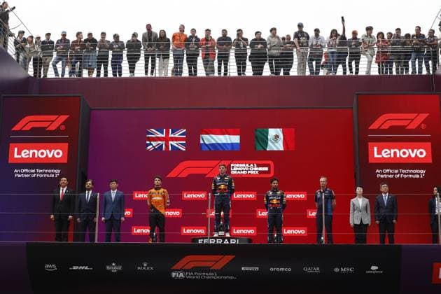 VERSTAPPEN Max (ned), Red Bull Racing RB20, portrait, NORRIS Lando (gbr), McLaren F1 Team MCL38, portrait and PEREZ Sergio (mex), Red Bull Racing RB20, portrait in the podium during the Formula 1 Lenovo Chinese Grand Prix 2024, 5th round of the 2024 Formula One World Championship, WM, Weltmeisterschaft from April 19 to 21, 2024 on the Shanghai International Circuit, in Shanghai, China - F1 - CHINESE GRAND PRIX 2024 DPPI Panoramic  240421_R05_CHINA_DP__A6A2274