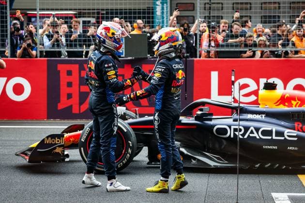 VERSTAPPEN Max (ned), Red Bull Racing RB20, portrait celebrating victory with PEREZ Sergio (mex), Red Bull Racing RB20, during the Formula 1 Lenovo Chinese Grand Prix 2024, 5th round of the 2024 Formula One World Championship, WM, Weltmeisterschaft from April 19 to 21, 2024 on the Shanghai International Circuit, in Shanghai, China - F1 - CHINESE GRAND PRIX 2024 DPPI Panoramic  240421_R05_CHINA_DP_FGOO3047