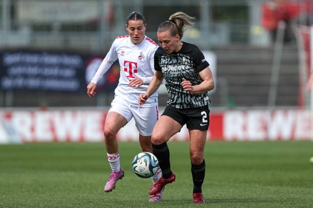 Carlotta Wamser 1 FC Koeln and Lisa Karl SC Freiburg in a duel, Frauen Bundesliga, 1 FC Koeln SC Freiburg, Franz Kremer Stadion on April 21, 2024 in Cologne, Germany Photo by Oliver Kaelke DeFodi Images Carlotta Wamser 1 FC Koeln and Lisa Karl SC Freiburg battle for the ball, Frauen Bundesliga, 1 FC Koeln SC Freiburg, Franz Kremer Stadion on April 21, 2024 in Cologne, Germany Photo by Oliver Kaelke DeFodi Images Defodi 678 2024 04 121 OK FCKSCF 0534 Defodi-678