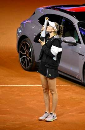 Award ceremony, honoring Elena Rybakina KAZ with trophy in front of winning car Porsche Taycan 4S Sport Turismo Kuss kisses trophy Tennis Ladies Porsche Cup Porsche Tennis Grand Prix GP Stuttgart 2024 Porsche Arena 21 04 2024 DFL REGULATIONS PROHIBIT ANY USE OF PHOTOGRAPHS AS IMAGE SEQUENCES AND OR QUASI VIDEO Porsche Tennis Grand Prix GP Stuttgart 2024