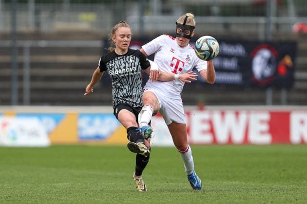 Lisa Kolb SC Freiburg and Celina Degen 1 FC Koeln in duel, Frauen Bundesliga, 1 FC Koeln SC Freiburg, Franz Kremer Stadion on April 21, 2024 in Cologne, Germany Photo by Oliver Kaelke DeFodi Images Lisa Kolb SC Freiburg and Celina Degen 1 FC Koeln battle for the ball, Frauen Bundesliga, 1 FC Koeln SC Freiburg, Franz Kremer Stadion on April 21, 2024 in Cologne, Germany Photo by Oliver Kaelke DeFodi Images Defodi 678 2024 04 121 OK FCKSCF 0940 Defodi-678
