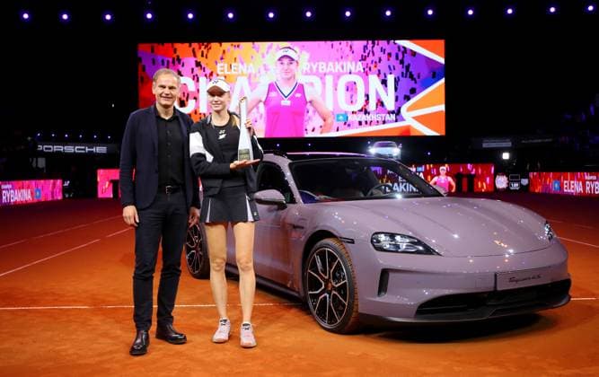 21 04 2024, Germany, Stuttgart, Porsche Tennis Grand Prix 2024, final, from left Oliver Blume Chairman of the Executive Board of Porsche and Volkswagen AG and Elena Rybakina KAZ with trophy in front of the winning Taycab 4S Sport Turismo car