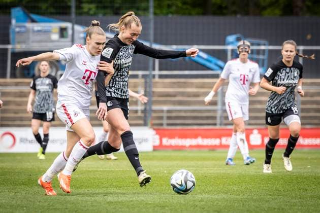 GOOGLE PIXEL Womens Bundesliga 1 FC Köln SC Freiburg, 21 04 2024 Alena Bienz 1 FC Köln, 11 and Janina Minge SC Freiburg, 9 GOOGLE PIXEL Womens Bundesliga 1 FC Köln SC Freiburg, 19 Matchday, on 21 04 2024 at Franz Kremer Stadium in Cologne DFL REGULATIONS PROHIBIT ANY USE OF PHOTOGRAPHS AS IMAGE SEQUENCES AND OR QUASI VIDEO Copyright: xBEAUTIFULxSPORTS LeahxKohringx