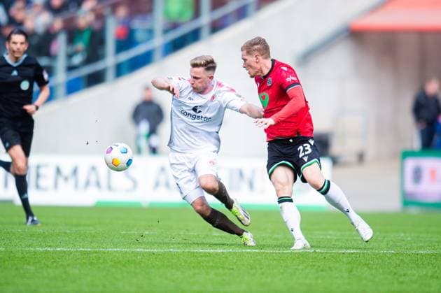21 04 2024 Soccer, 2023 2024, 1 Bundesliga, Matchday 30, Hannover 96 FC St Pauli L R Johannes Eggestein Pauli , Marcel Halstenberg Hannover DFL REGULATIONS PROHIBIT ANY USE OF PHOTOGRAPHS AS IMAGE SEQUENCES AND OR QUASI VIDEO