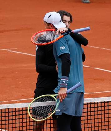 (240422) -- MUNICH, April 22, 2024 -- Jan-Lennard Struff (R) of Germany hugs Taylor Fritz of the United States after their men s singles final at the BMW Open 2024 tennis tournament in Munich, Germany, April 21, 2024. (Photo by Xinhua) (SP)GERMANY-MUNICH-TENNIS-BMW OPEN-MEN S SINGLES-FINAL PhilippexRuiz 