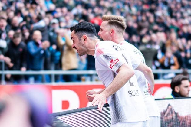 21 04 2024 Soccer, 2023 2024, 1 Bundesliga, Matchday 30, Hannover 96 FC St Pauli R Johannes Eggestein Pauli celebrates after his goal for 1 2 with L Manolis Saliakas Pauli DFL REGULATIONS PROHIBIT ANY USE OF PHOTOGRAPHS AS IMAGE SEQUENCES AND OR QUASI VIDEO