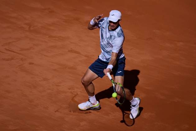 Mutua Madrid Open - Day One Facundo Bagnis of Argentina returns a shot against David Goffin of Belgium during day one of the Mutua Madrid Open 2024 at Caja Magica on April 22, 2024, in Madrid, Spain. Madrid Caja Magica Madrid Spain RL_MMO24_032 Copyright: xRicardoxLarreinax