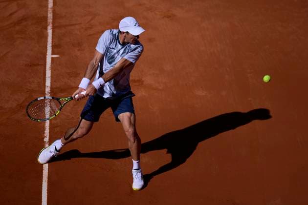 Mutua Madrid Open - Day One Facundo Bagnis of Argentina returns a shot against David Goffin of Belgium during day one of the Mutua Madrid Open 2024 at Caja Magica on April 22, 2024, in Madrid, Spain. Madrid Caja Magica Madrid Spain RL_MMO24_038 Copyright: xRicardoxLarreinax