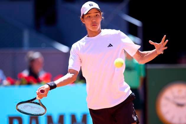 Mutua Madrid Open - Day One Amir Omarkhanov of Kazakhstan returns a shot against Roberto Bautista Agut of Spain during day one of the Mutua Madrid Open 2024 at Caja Magica on April 22, 2024, in Madrid, Spain. Madrid Caja Magica Madrid Spain RL_MMO24_112 Copyright: xRicardoxLarreinax