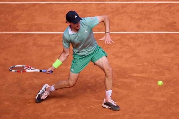 Mutua Madrid Open - Day One Dominic Thiem of Austria returns a shot against Felipe Meligeni Alves of Brasil during day one of the Mutua Madrid Open 2024 at Caja Magica on April 22, 2024, in Madrid, Spain. Madrid Caja Magica Madrid Spain RL_MMO24_194 Copyright: xRicardoxLarreinax