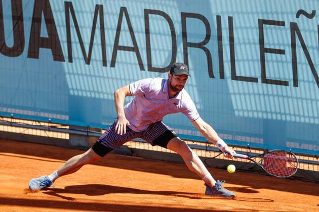 April 22, 2024, Madrid, Madrid, SPAIN: Jurij Rodionov of Austria in action against Valentin Vacherot of Monaco during the Mutua Madrid Open 2024, ATP, Tennis Herren Masters 1000 and WTA, Tennis Damen 1000, tournament celebrated at Caja Magica on April 22, 2024 in Madrid, Spain. Madrid SPAIN - ZUMAa181 20240422_zaa_a181_189 Copyright: xIrinaxR.xHipolitox