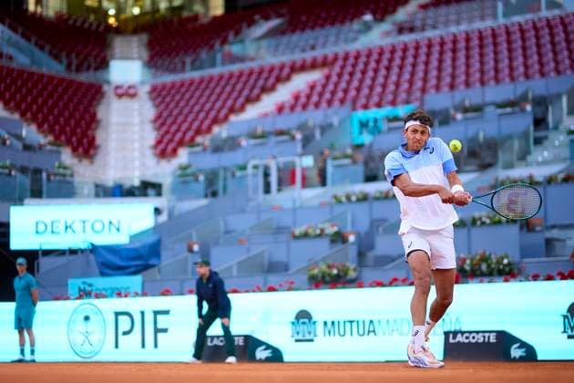 Mutua Madrid Open - Day One Emilio Nava of USA returns a shot against Benjamin Hassan of Germany during day one of the Mutua Madrid Open 2024 at Caja Magica on April 22, 2024, in Madrid, Spain. Madrid Caja Magica Madrid Spain RL_MMO24_258 Copyright: xRicardoxLarreinax