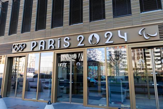 Saint Denis, France March 22, 2024 - The Paris 2024 logo stands on the Organizing Committee for the Olympic and Paralympic Games COJOP headquarters. With four months to go before the start of the Olympic Games, Olympische Spiele, Olympia, OS in Paris, the French capital is in a state of transformation as the organisation begins to take shape. OLY, JEUX OLYMPIQUES, ILLUSTRATION, LOGO, PARIS 2024, BUREAUX, COJOP, ANNEAUX OLYMPIQUES, COMITE D ORGANISATION DES JEUX OLYMPIQUES, GENERIQUE, JEUX PARALYMPIQUES, TONY ESTANGUET, SEINE SAINT DENIS, EVENEMENT SPORTIF, Copyright: xVincentxIsorex Copyright: xIMAGO VincentxIsorex