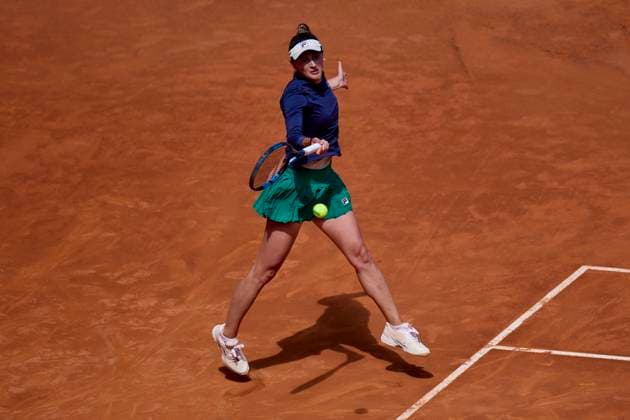 Mutua Madrid Open - Day Two Irina-Camelia Begu of Romania returns a shot against Linda Fruhvirtova of the Czech Republic during day two of the Mutua Madrid Open 2024 at Caja Magica on April 23, 2024, in Madrid, Spain. Madrid Caja Magica Madrid Spain RL_MMO24_401 Copyright: xRicardoxLarreinax