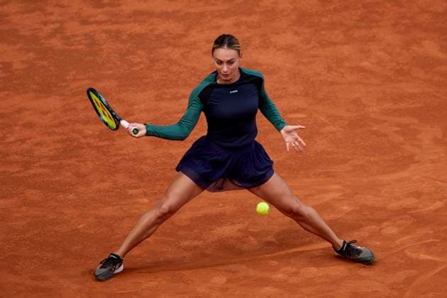 Mutua Madrid Open - Day Two Ana Bogdan of Romania returns a shot against Xiyu Wang of China during day two of the Mutua Madrid Open 2024 at Caja Magica on April 23, 2024, in Madrid, Spain. Madrid Caja Magica Madrid Spain RL_MMO24_434 Copyright: xRicardoxLarreinax