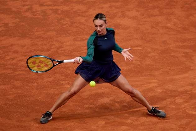 Mutua Madrid Open - Day Two Ana Bogdan of Romania returns a shot against Xiyu Wang of China during day two of the Mutua Madrid Open 2024 at Caja Magica on April 23, 2024, in Madrid, Spain. Madrid Caja Magica Madrid Spain RL_MMO24_435 Copyright: xRicardoxLarreinax