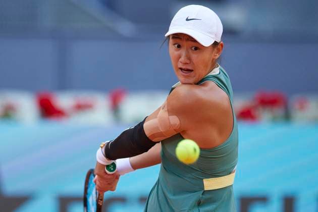 MADRID, SPAIN - APRIL 23: Wang Xiyu of China returns a shot in the Women s Singles Round of 128 match against Ana Bogdan of Romania on day one of Mutua Madrid Open 2024 at La Caja Magica on April 23, 2024 in Madrid, Spain.  Copyright: xVCGx 111492571393