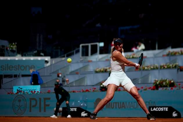 Mutua Madrid Open - Day Three Paula Badosa of Spain returns a shot against Jessica Bouzas Maneiro of Spain during day three of the Mutua Madrid Open 2024 at Caja Magica on April 24, 2024, in Madrid, Spain. Madrid Caja Magica Madrid Spain RL_MMO24_549 Copyright: xRicardoxLarreinax
