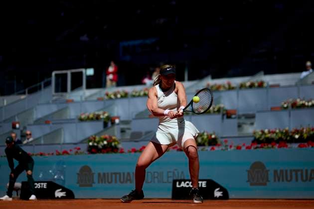 Mutua Madrid Open - Day Three Paula Badosa of Spain returns a shot against Jessica Bouzas Maneiro of Spain during day three of the Mutua Madrid Open 2024 at Caja Magica on April 24, 2024, in Madrid, Spain. Madrid Caja Magica Madrid Spain RL_MMO24_554 Copyright: xRicardoxLarreinax