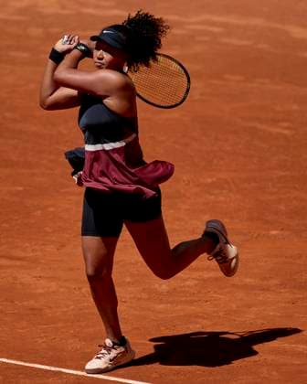 Mutua Madrid Open - Day Three Naomi Osaka of Japan returns a shot against Greet Minnen of Belgium during day two of the Mutua Madrid Open 2024 at Caja Magica on April 23, 2024, in Madrid, Spain. Madrid Caja Magica Madrid Spain RL_MMO24_812 Copyright: xRicardoxLarreinax