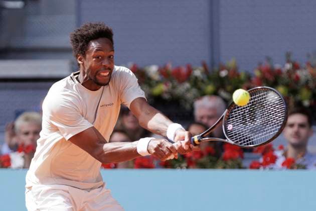 MADRID, SPAIN - APRIL 24: Gael Monfils returns a shot against Luciano Darder during their match on Day 3 of the Mutua Madrid Open at Caja Magica Stadium in Madrid. ONLYxEDITORIALxUSAGE  (251138085)