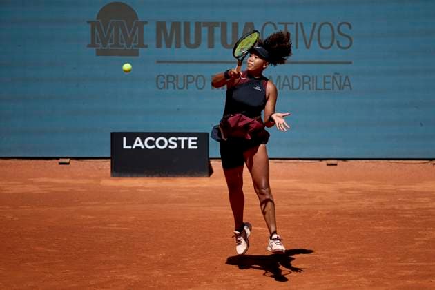 Naomi Osaka of Japan returns a shot against Greet Minnen of Belgium during day two of the Mutua Madrid Open 2024 at Caja Magica on April 23, 2024, in Madrid, Spain.  (251171056)