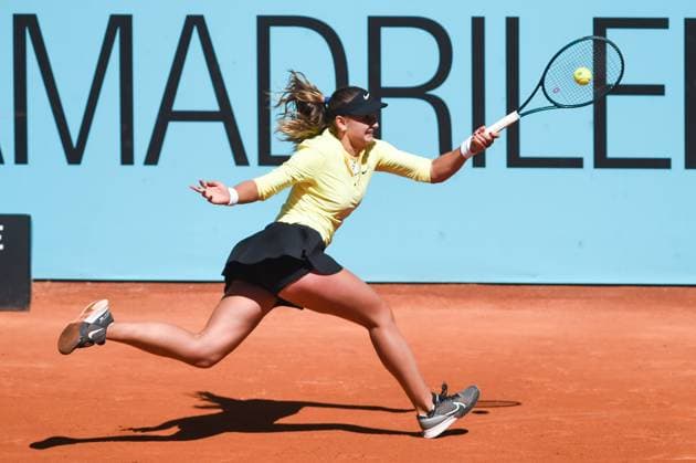 (240425) -- MADRID, April 25, 2024 -- Victoria Jimenez of Andorra hits a return to Zhu Lin of China during the women s singles first round match of 2024 Madrid Open tennis tournament in Madrid, Spain, April 25, 2024. (Photo by Xinhua) (SP)SPAIN-MADRID-TENNIS-2024 MADRID OPEN-WOMENS SINGLES GustavoxValiente 