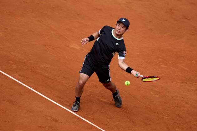 Mutua Madrid Open - Day Four Yoshihito Nishioka of Japan returns a shot against Felix Auger-Aliassime of Canada during day four of the Mutua Madrid Open 2024 at Caja Magica on April 25, 2024, in Madrid, Spain. Madrid Caja Magica Madrid Spain RL_MMO24_00548 Copyright: xRicardoxLarreinax