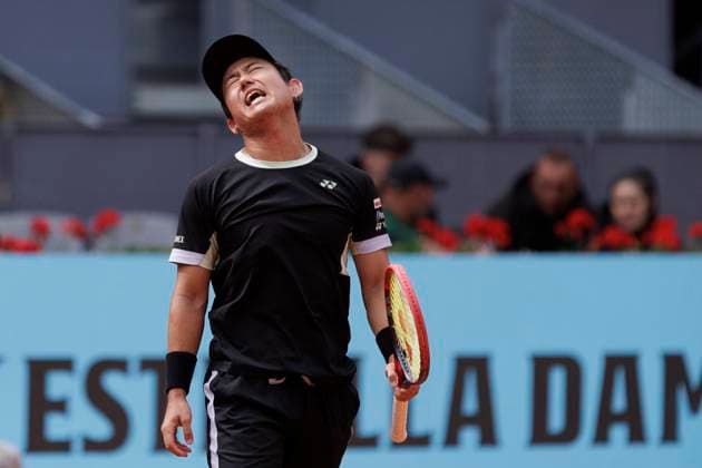 MADRID, SPAIN - APRIL 25: Yoshihito regret a mistake against Felix Auger during their match on Day 4 of the Mutua Madrid Open at Caja Magica Stadium in Madrid. ONLYxEDITORIALxUSAGE  (251219117)