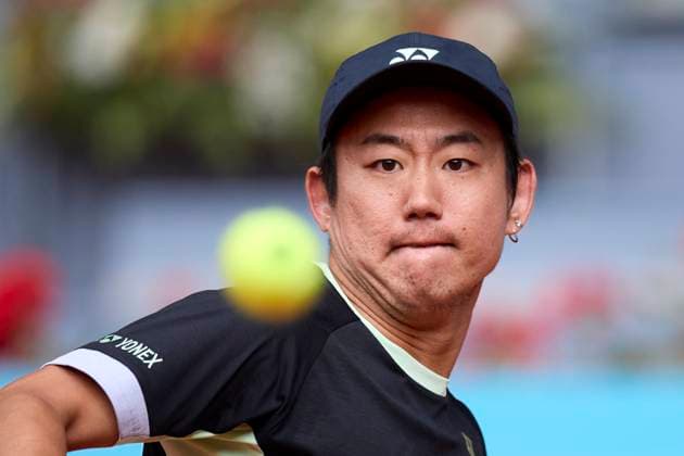Yoshihito Nishioka of Japan returns a shot against Felix Auger-Aliassime of Canada during day four of the Mutua Madrid Open 2024 at Caja Magica on April 25, 2024, in Madrid, Spain.  (251221724)