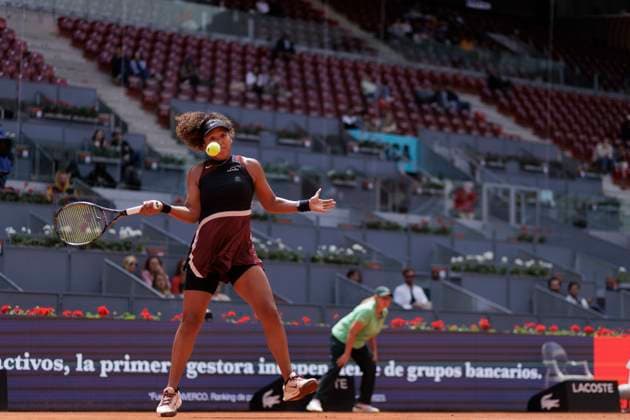 MADRID, SPAIN - APRIL 25: Naomi Osaka returns a shot against Liudmila Samsonova during their match on Day 4 of the Mutua Madrid Open at Caja Magica Stadium in Madrid. ONLYxEDITORIALxUSAGE  (251227370)