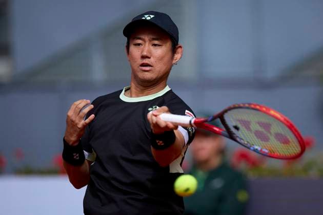Yoshihito Nishioka of Japan returns a shot against Felix Auger-Aliassime of Canada during day four of the Mutua Madrid Open 2024 at Caja Magica on April 25, 2024, in Madrid, Spain.  (251246058)
