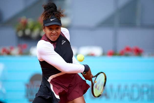 Mutua Madrid Open - Day Four Naomi Osaka of Japan returns a shot against Liudmila Samsonova during day four of the Mutua Madrid Open 2024 at Caja Magica on April 25, 2024, in Madrid, Spain. Madrid Caja Magica Madrid Spain RL_MMO24_01048 Copyright: xRicardoxLarreinax