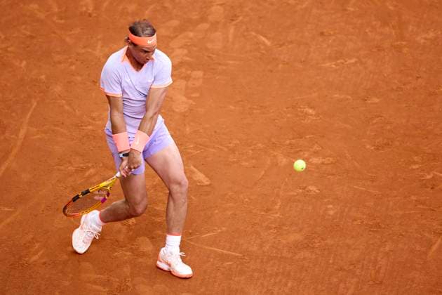 Mutua Madrid Open - Day Four Rafael Nadal of Spain returns a shot against Darwin Blanch of United States during day four of the Mutua Madrid Open 2024 at Caja Magica on April 25, 2024, in Madrid, Spain. Madrid Caja Magica Madrid Spain RL_MMO24_01276 Copyright: xRicardoxLarreinax
