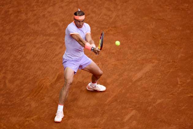 Mutua Madrid Open - Day Four Rafael Nadal of Spain returns a shot against Darwin Blanch of United States during day four of the Mutua Madrid Open 2024 at Caja Magica on April 25, 2024, in Madrid, Spain. Madrid Caja Magica Madrid Spain RL_MMO24_01286 Copyright: xRicardoxLarreinax