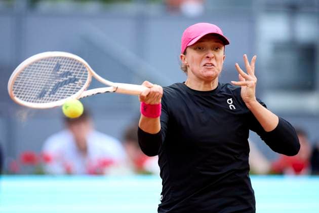 Mutua Madrid Open - Day Four Iga Swiatek of Poland returns a shot against Xiyu Wang of China during day four of the Mutua Madrid Open 2024 at Caja Magica on April 25, 2024, in Madrid, Spain. Madrid Caja Magica Madrid Spain RL_MMO24_01343 Copyright: xRicardoxLarreinax