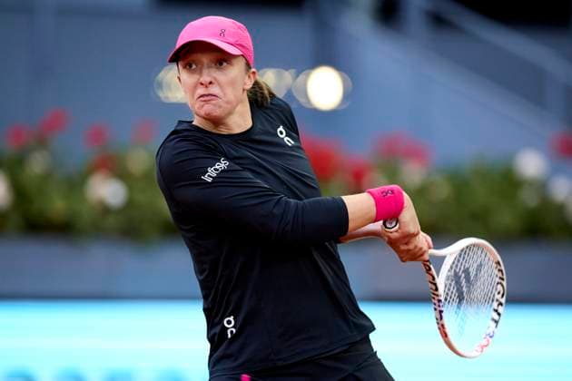 Mutua Madrid Open - Day Four Iga Swiatek of Poland returns a shot against Xiyu Wang of China during day four of the Mutua Madrid Open 2024 at Caja Magica on April 25, 2024, in Madrid, Spain. Madrid Caja Magica Madrid Spain RL_MMO24_01357 Copyright: xRicardoxLarreinax