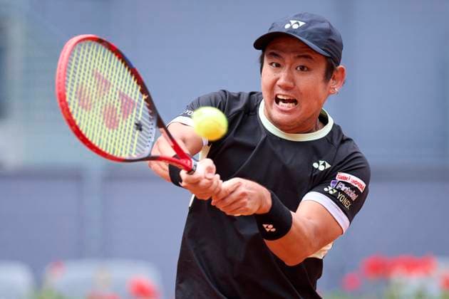 Yoshihito Nishioka of Japan returns a shot against Felix Auger-Aliassime of Canada during day four of the Mutua Madrid Open 2024 at Caja Magica on April 25, 2024, in Madrid, Spain.  (251251754)