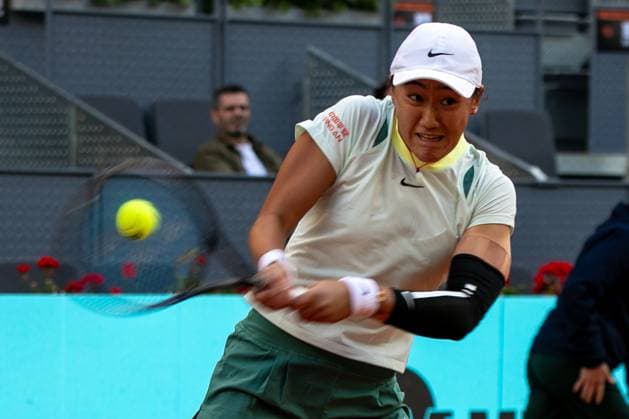 April 25, 2024, Madrid, Spain: Xiyu Wang of China plays against Iga Swiatek of Poland (not pictured) on Day Three during their 2nd Round match of the Mutua Madrid Open at La Caja Magica. Madrid Spain - ZUMAs197 20240425_aaa_s197_276 Copyright: xDavidxCanalesx