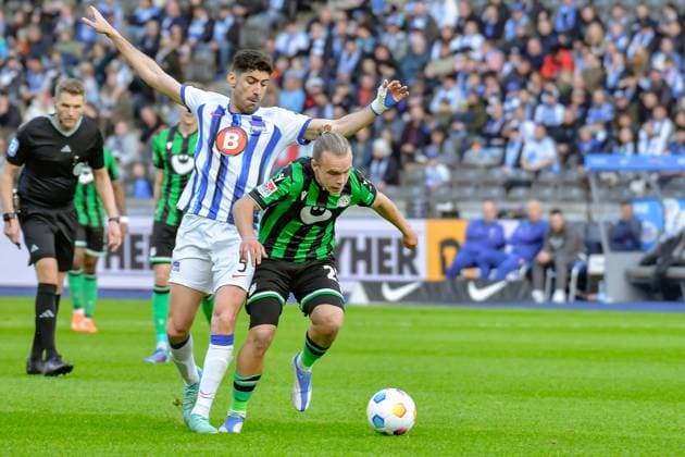Soccer 2 Bundesliga, Hertha BSC Hannover 96 26 04 2024,xdanx,Soccer 2 Bundesliga, Hertha BSC Hannover 96, v l Andreas Bouchalakis Hertha BSC 5 ,Lars Gindorf Hannover 96 25 ,Zweikampf, Duell, Kampf, tackle DFL DFB REGULATIONS PROHIBIT ANY USE OF PHOTOGRAPHS as IMAGE SEQUENCES and or QUASI VIDEO Foto Daniel Lakomski Berlin Olympiastadion Berlin Berlin Germany EN Copyright: xDanielxLakomskix