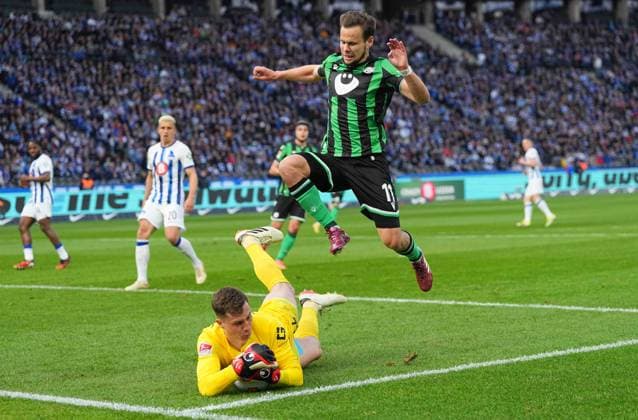 Tjark Ernst Hertha Berlin and Louis Schaub Hannover 96 battle for the ball, 2 Bundesliga, Hertha BSC vs Hannover 96, Olympic Stadium on April 26, 2024 in Berlin, Germany Photo by Ulrik Pedersen DeFodi Images Tjark Ernst Hertha Berlin and Louis Schaub Hannover 96 battle for the ball, 2 Bundesliga, Hertha BSC vs Hannover 96, Olympic Stadium on April 26, 2024 in Berlin, Germany Photo by Ulrik Pedersen DeFodi Images DFB DFL REGULATIONS PROHIBIT ANY USE OF PHOTOGRAPHS AS IMAGE SEQUENCES AND OR QUASI VIDEO Defodi 659 184022 01000163 Defodi-659 DFB DFL REGULATIONS PROHIBIT ANY USE OF PHOTOGRAPHS AS IMAGE SEQUENCES AND OR QUASI-VIDEO.