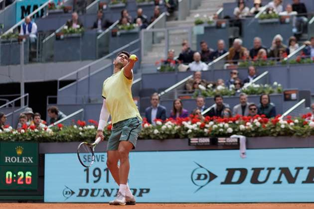 MADRID, SPAIN - APRIL 26:Carlos Alcaraz returns the ball against Alexander Shevchenko during their match on Day 5 of the Mutua Madrid Open at Caja Magica Stadium in Madrid. ONLYxEDITORIALxUSAGE (251341787)